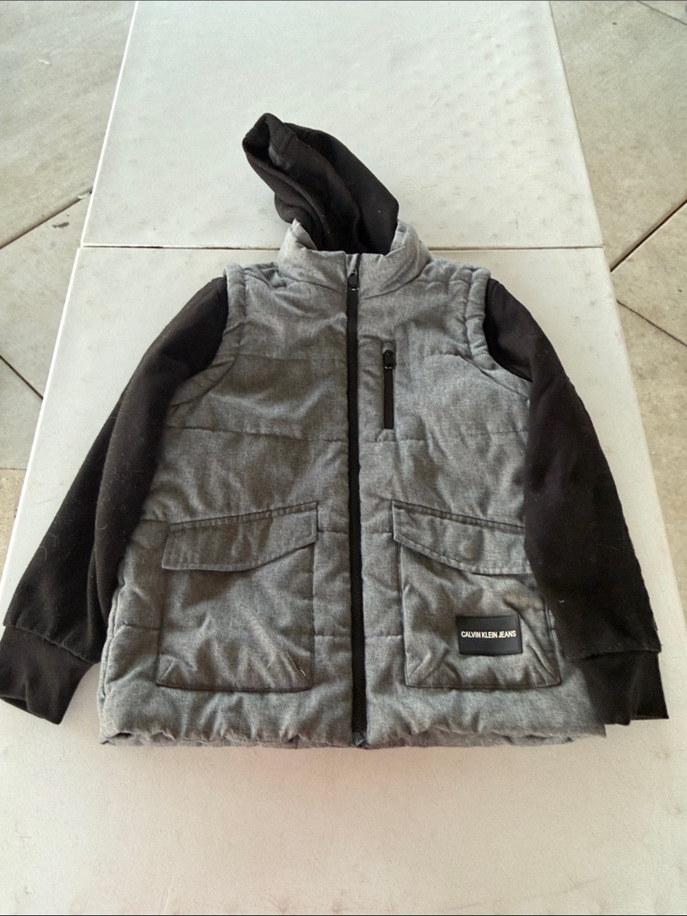 Calvin Klein Gray Puffer Jacket with Black Sleeves and Hood